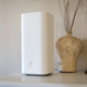 A photo of the Vilo mesh wifi node on the same mantle